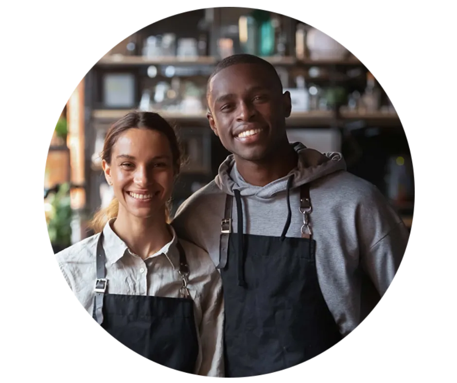 Elderly couple looking at bills and phone