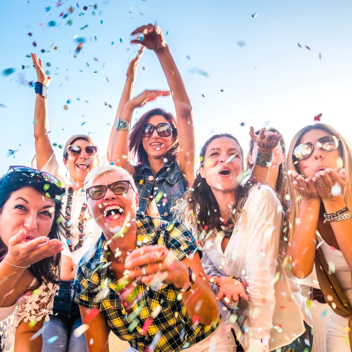 silhouette photo of man on cliff during sunset