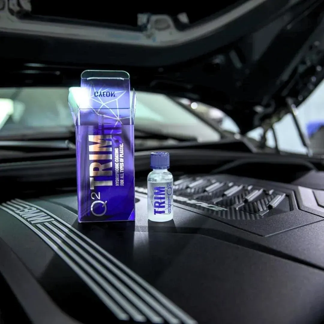 image of Q2 Trim product and packaging on a car dashboard used by HOOK Mobile Car Detailing and Ceramic Coatings