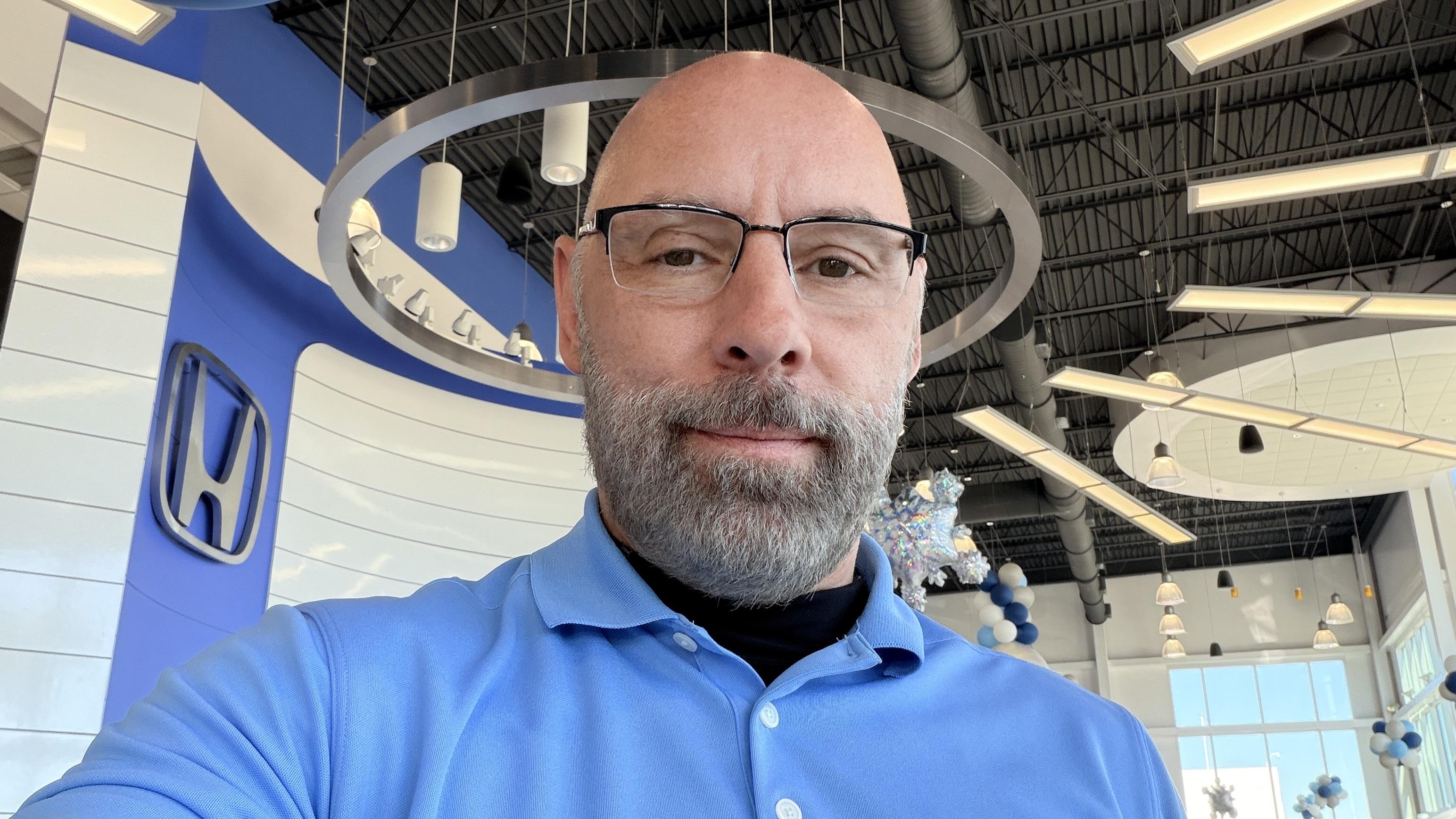 Tampa Honda consultant Daryle Hamel with vehicle