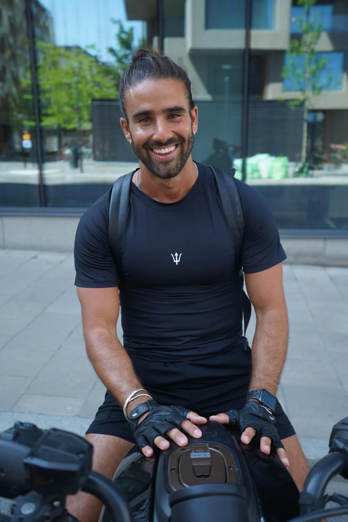 person facing down and holding two rods