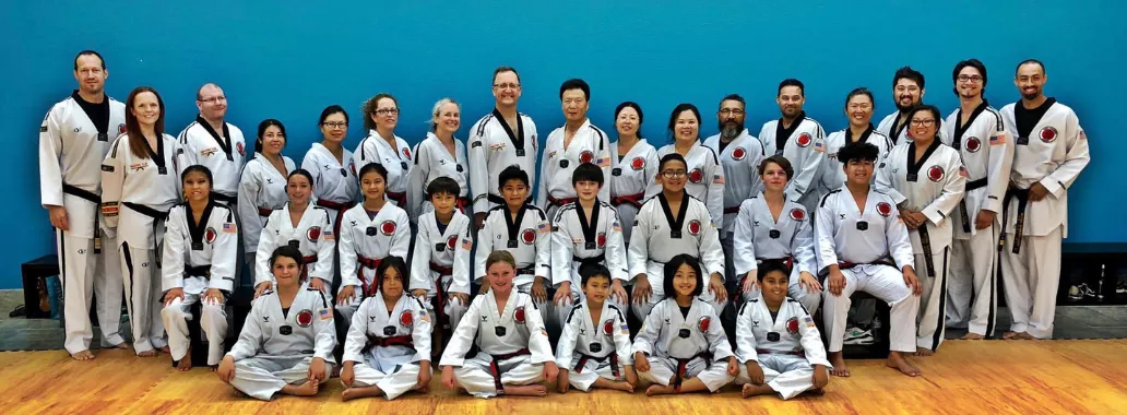 Carmichael Academy - Family Taekwondo Family Class Photo