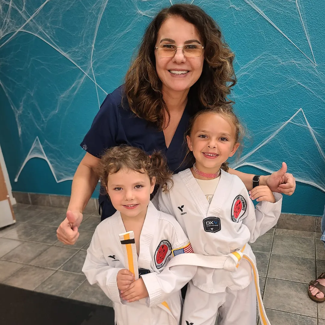 Smiling Family At Carmichael Academy - Family Taekwondo