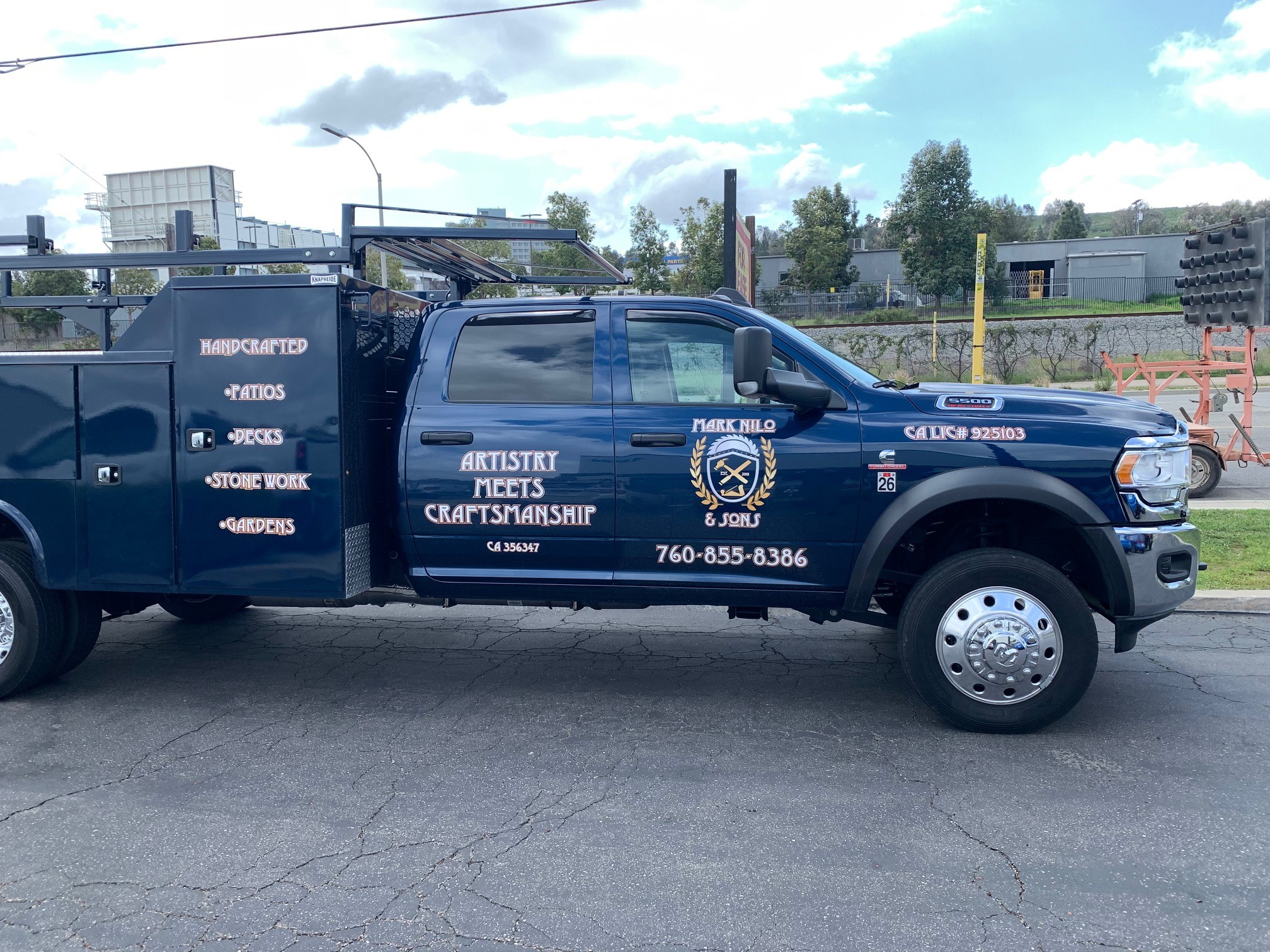 Professional service truck for Artistry Meets Craftsmanship parked on a residential street, showcasing real-world contractor results.