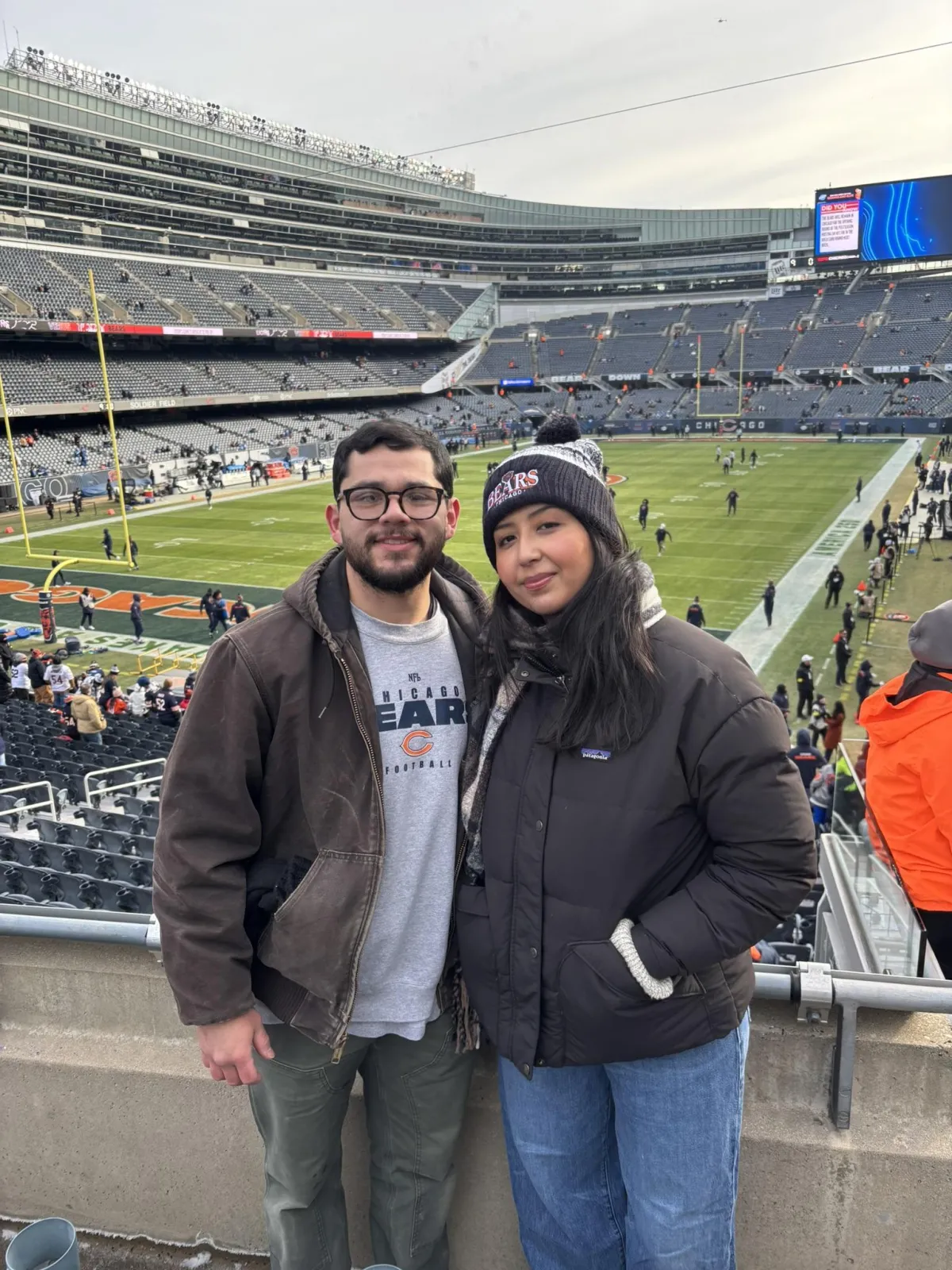 Jose R., owner of Grand Remodeling, standing on a football field as a featured Northline client.