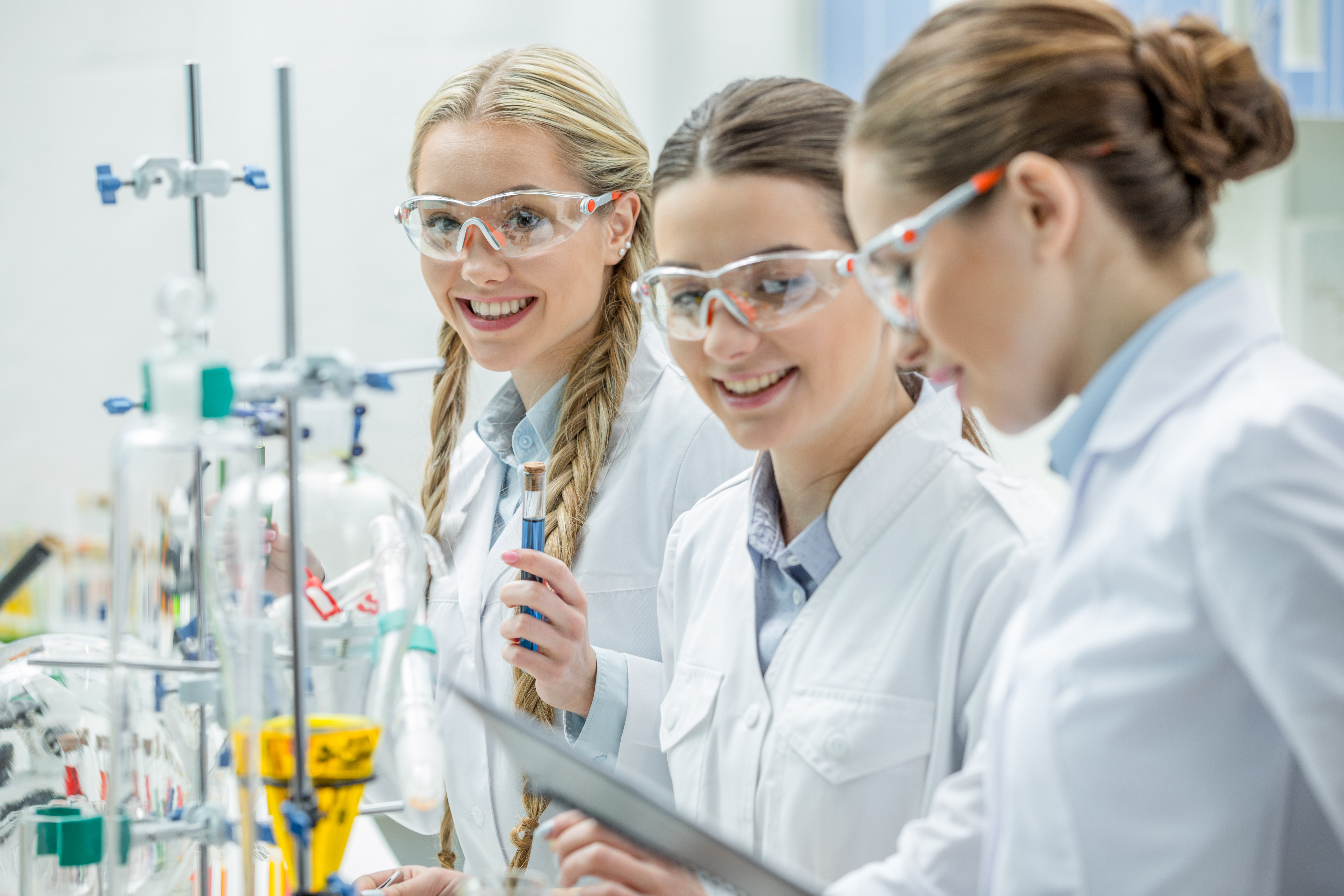 a group of women sitting next to each other