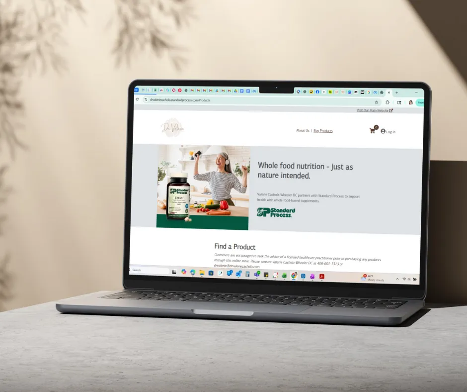 brown grass field near mountain under blue sky during daytime