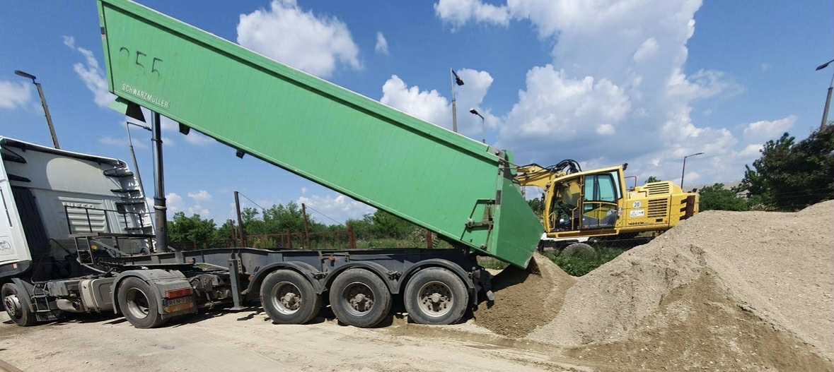 a close up of a cell phone on a white surface