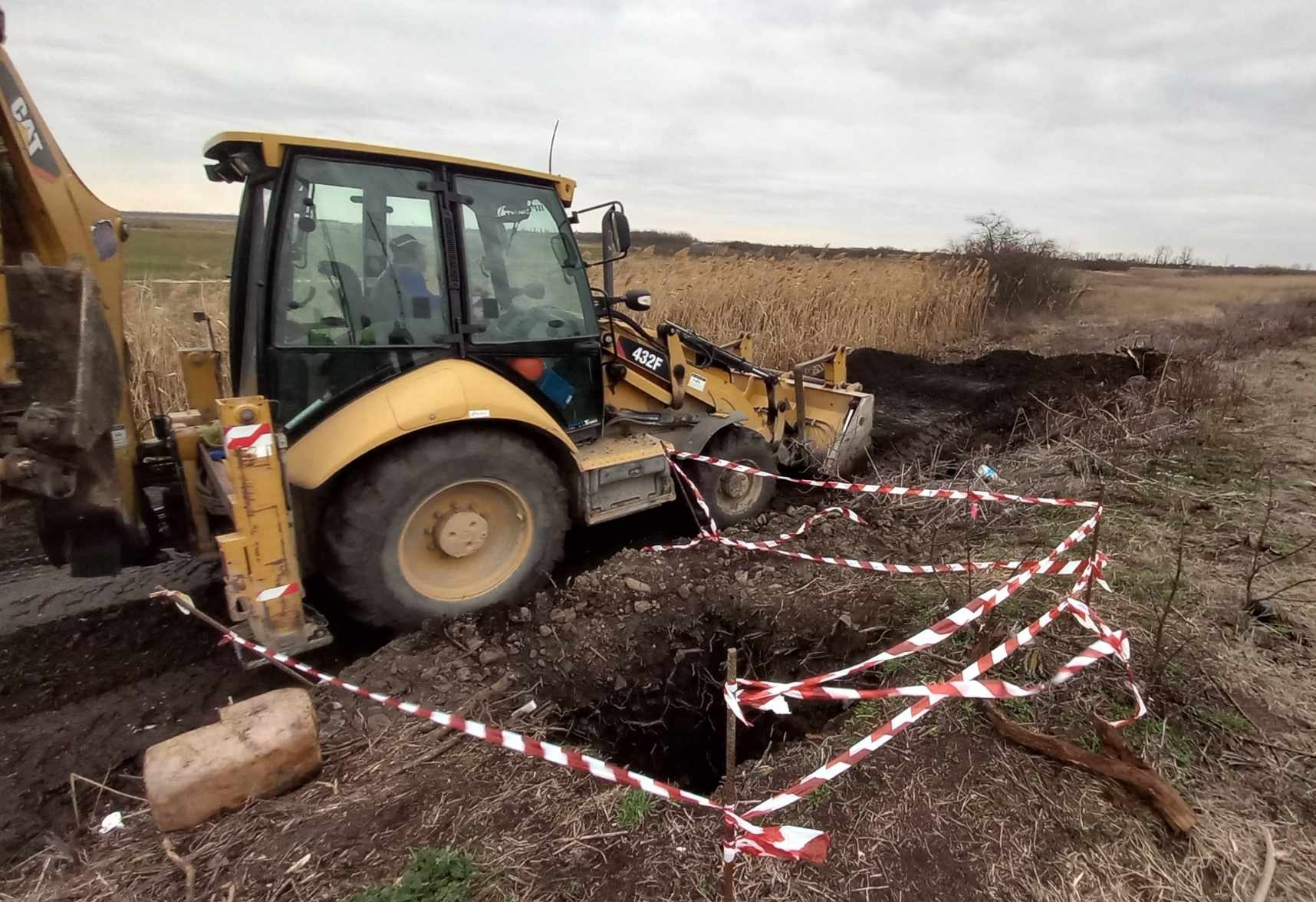 a close up of a cell phone on a white surface