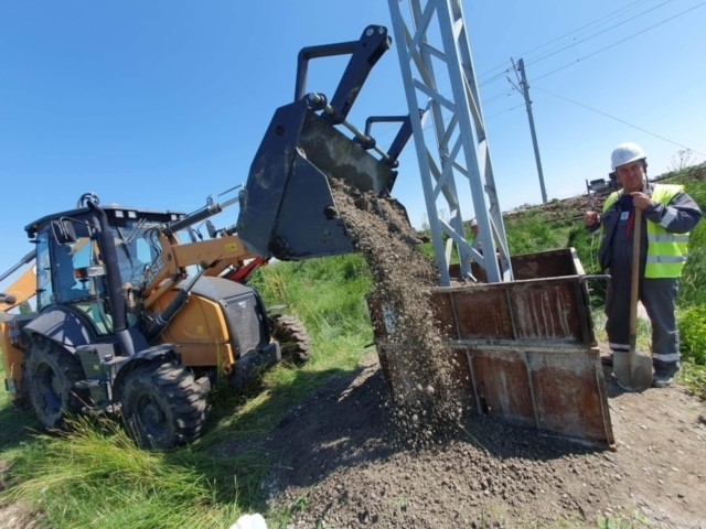 a close up of a cell phone on a white surface