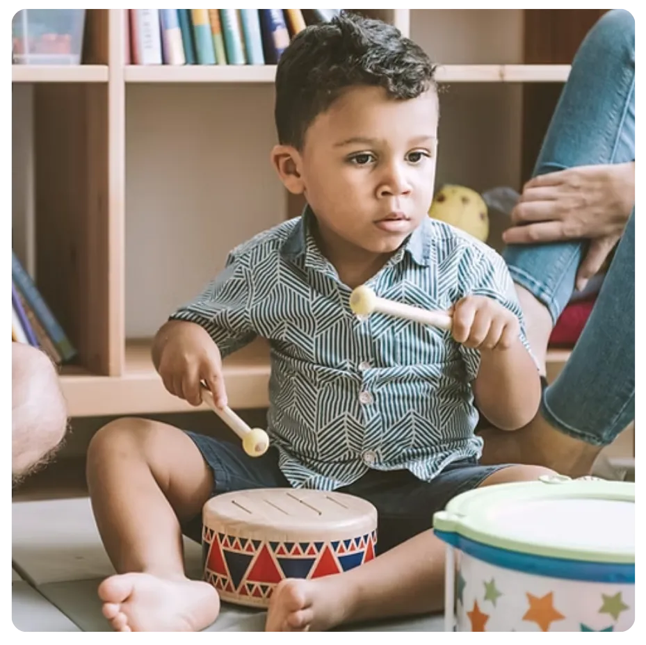 preshooler participating in music activity a bluegrass montessori