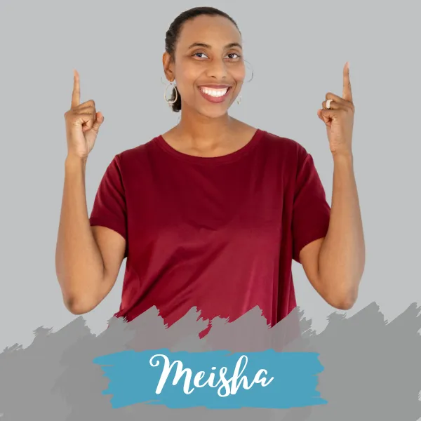 Portrait of Meisha Marshall smiling and pointing upward, founder of Renew Mindset Coaching, relationship coach for adult children of divorce