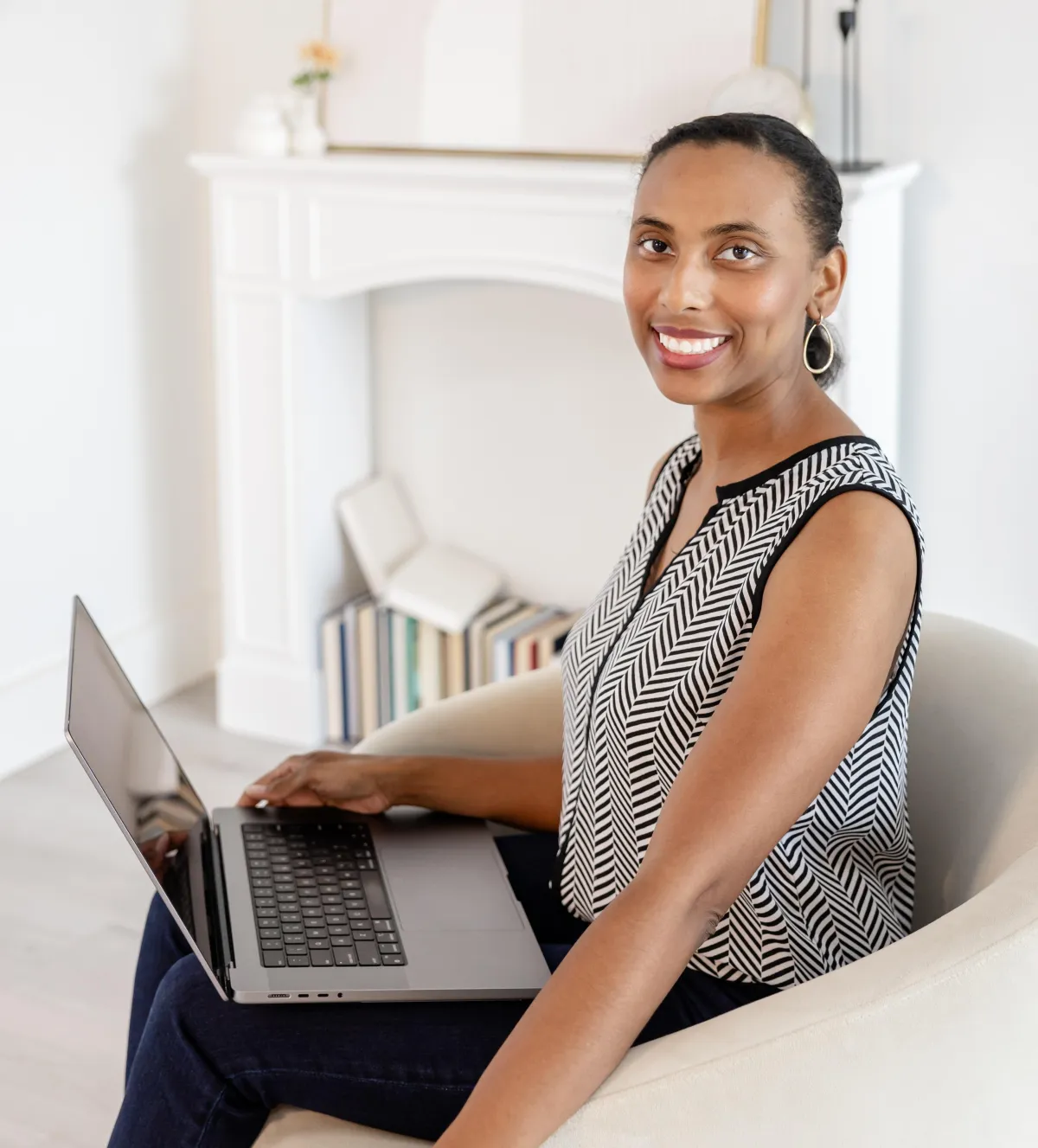Meisha Marshall smiling with laptop