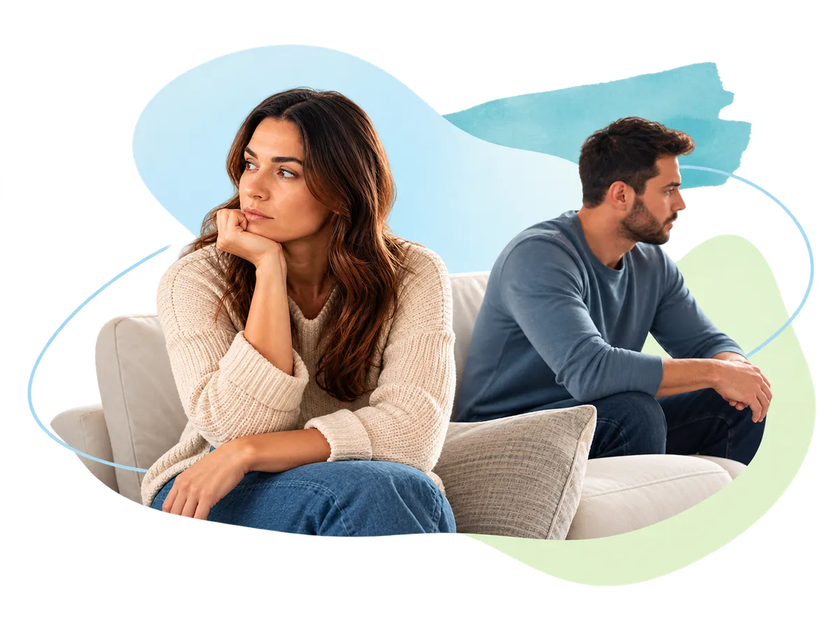 Couple sitting apart after an unresolved relationship conflict