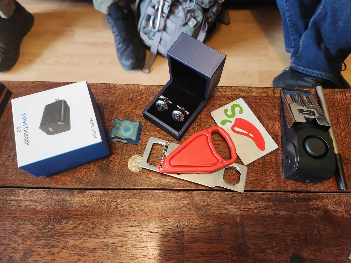 Landscape image showing a quiet, minimalist outdoor recovery area with hot tub and natural pond at dusk, cinematic low-key aesthetics.