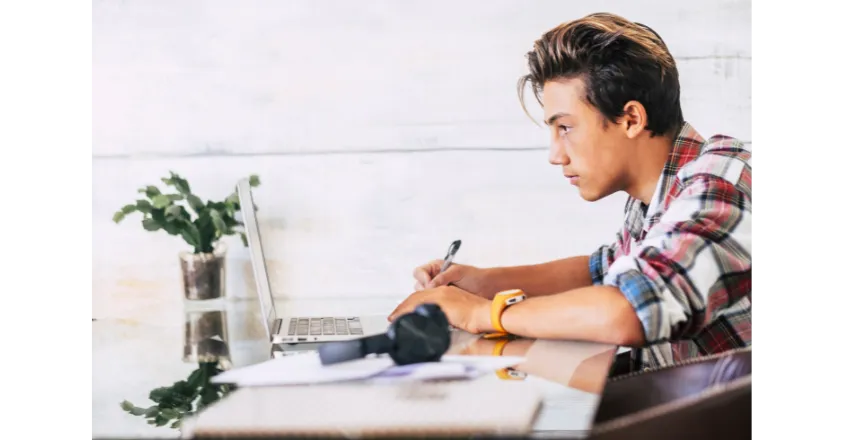 man in black shirt using computer