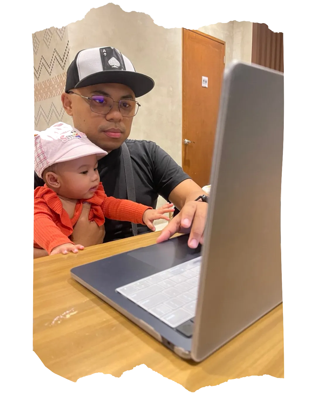 “Binsoy Basilio Coffee Daddy PH working from a coffee shop"”