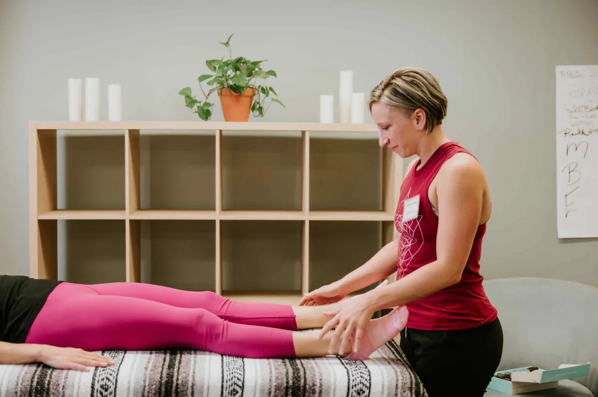 a person walking along a beach next to the ocean
