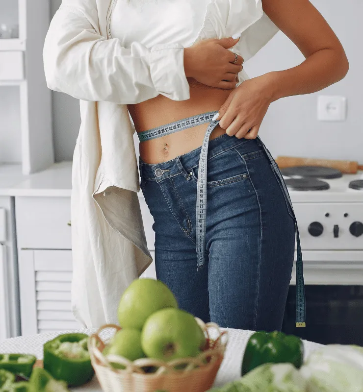 Fit Women Measuring Her Waist
