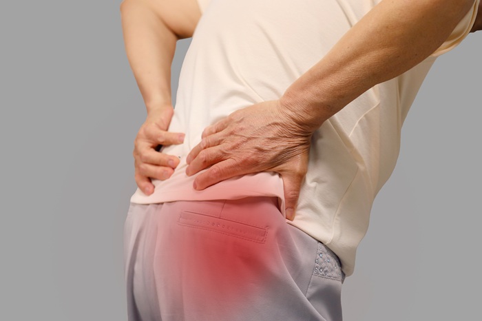 Old man with sharp back pain