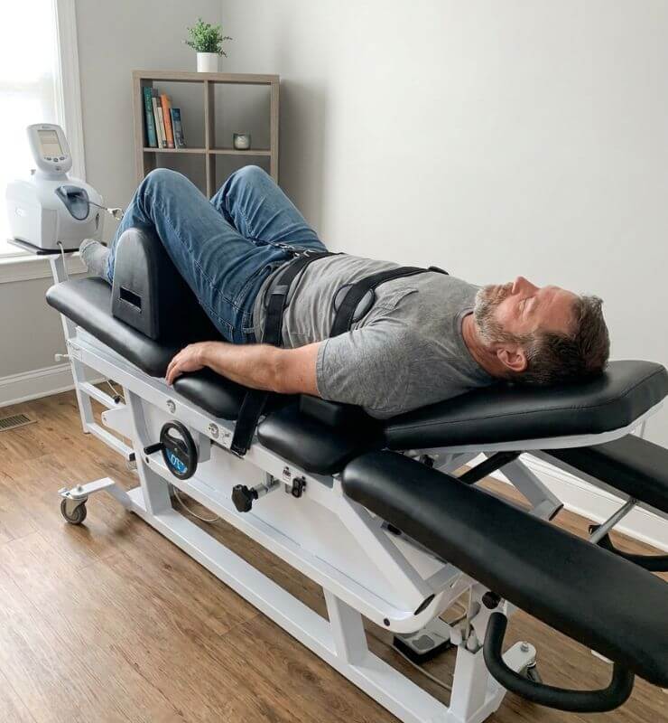 Male patient getting spinal decompression session in el cajon