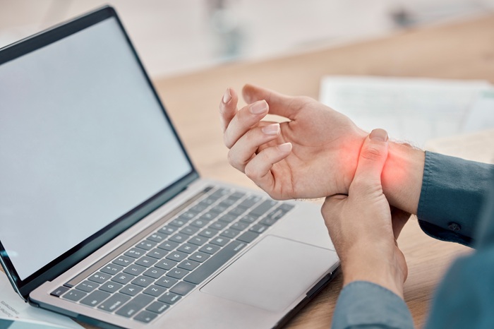 Patient in Spinal Decompression Machine