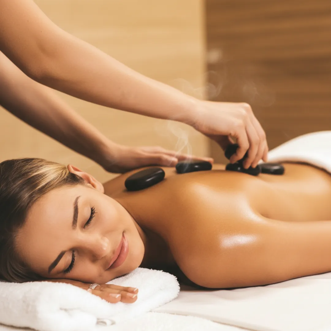 Hot Stone Massage in Werribee with warm stones placed to relieve tension and promote deep relaxation.