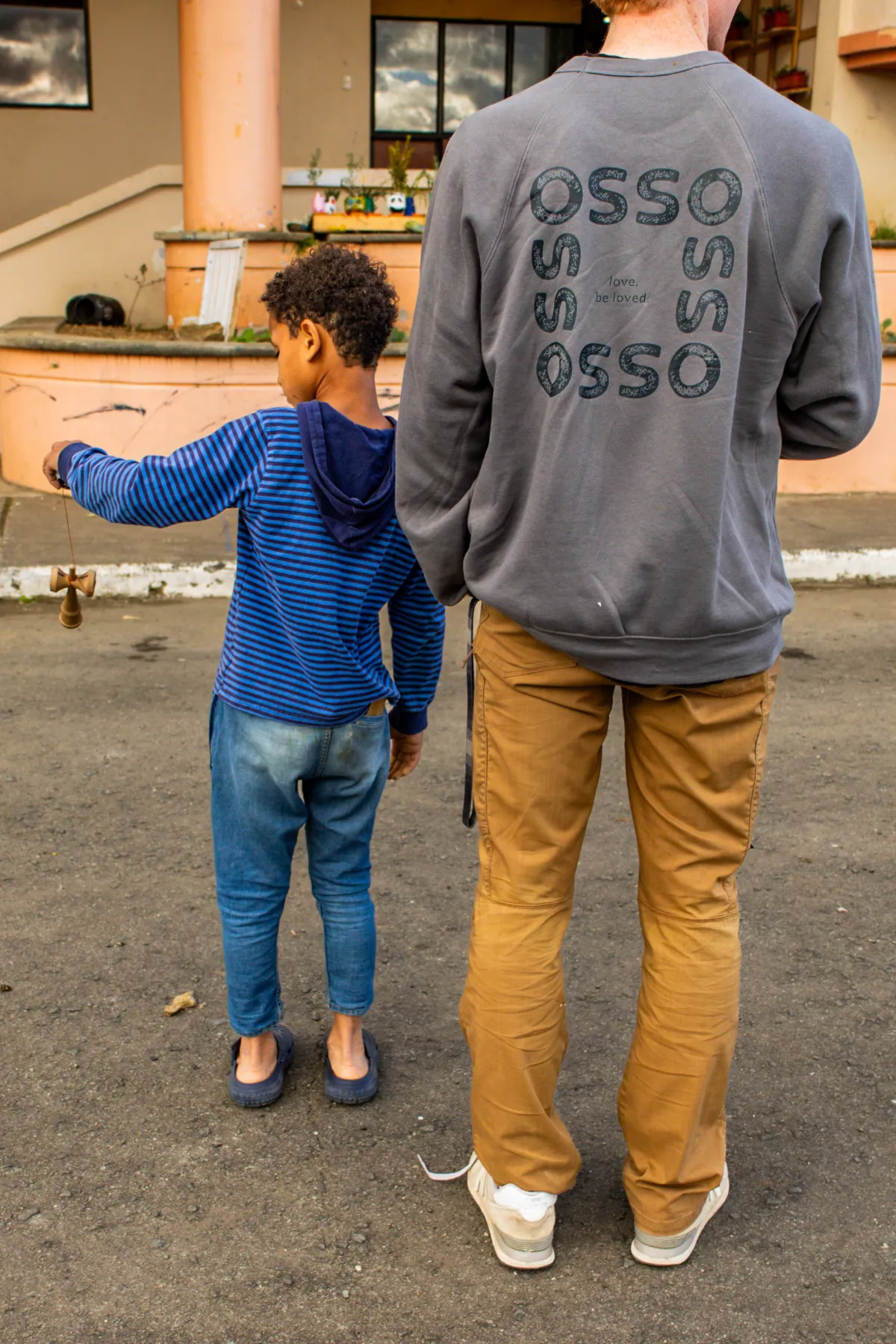 volunteer holding a child