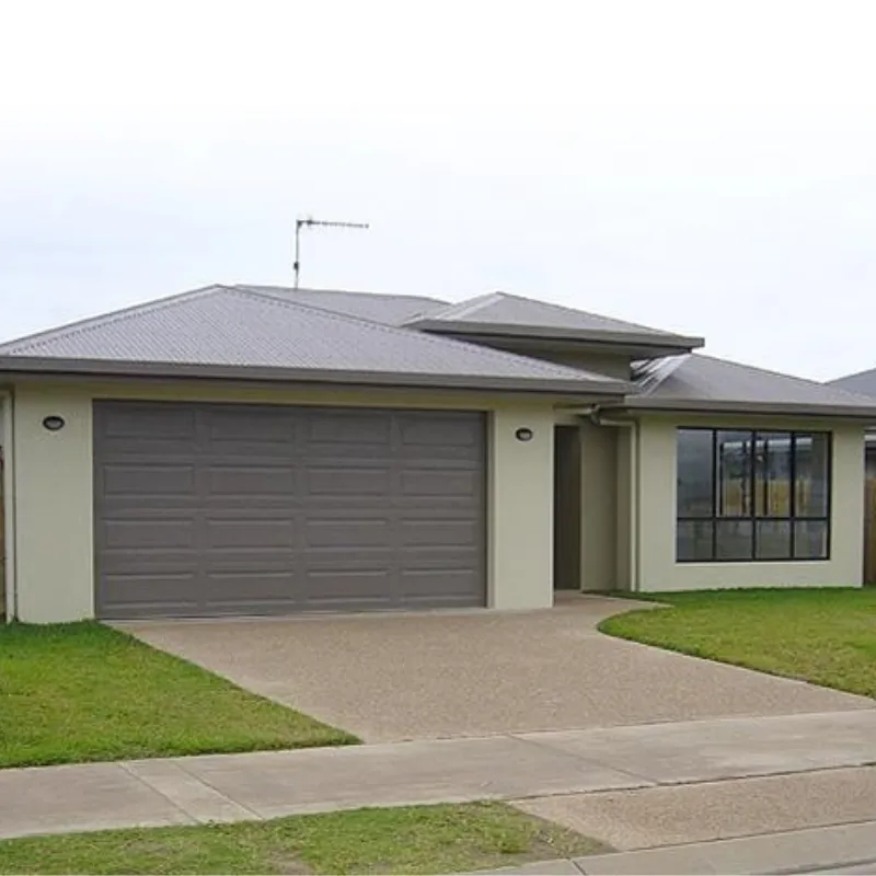 Modern family home with a double garage and landscaped front yard, showcasing successful property acquisition by Arin Russell Buyers Agents.