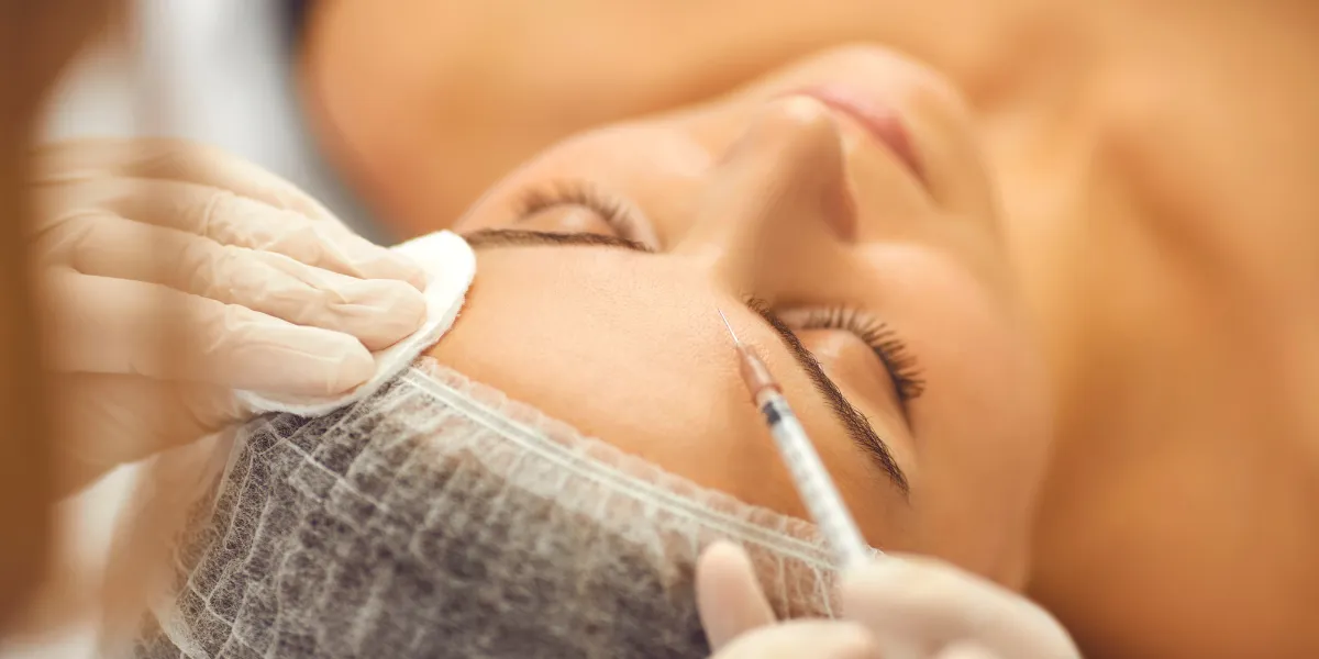Young woman having botox