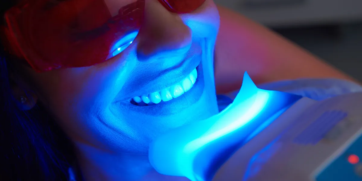 Woman getting her teeth whitening