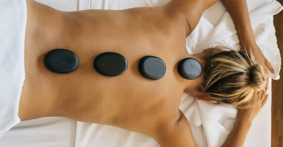 Woman getting a hot stone massage