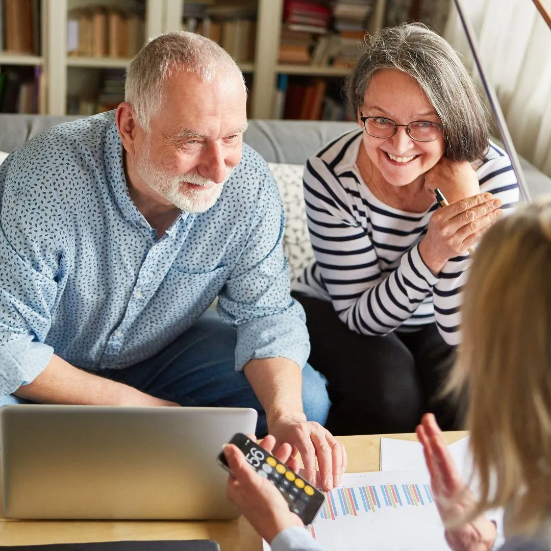 Senior Couple Calculating costs for 24 hour home care