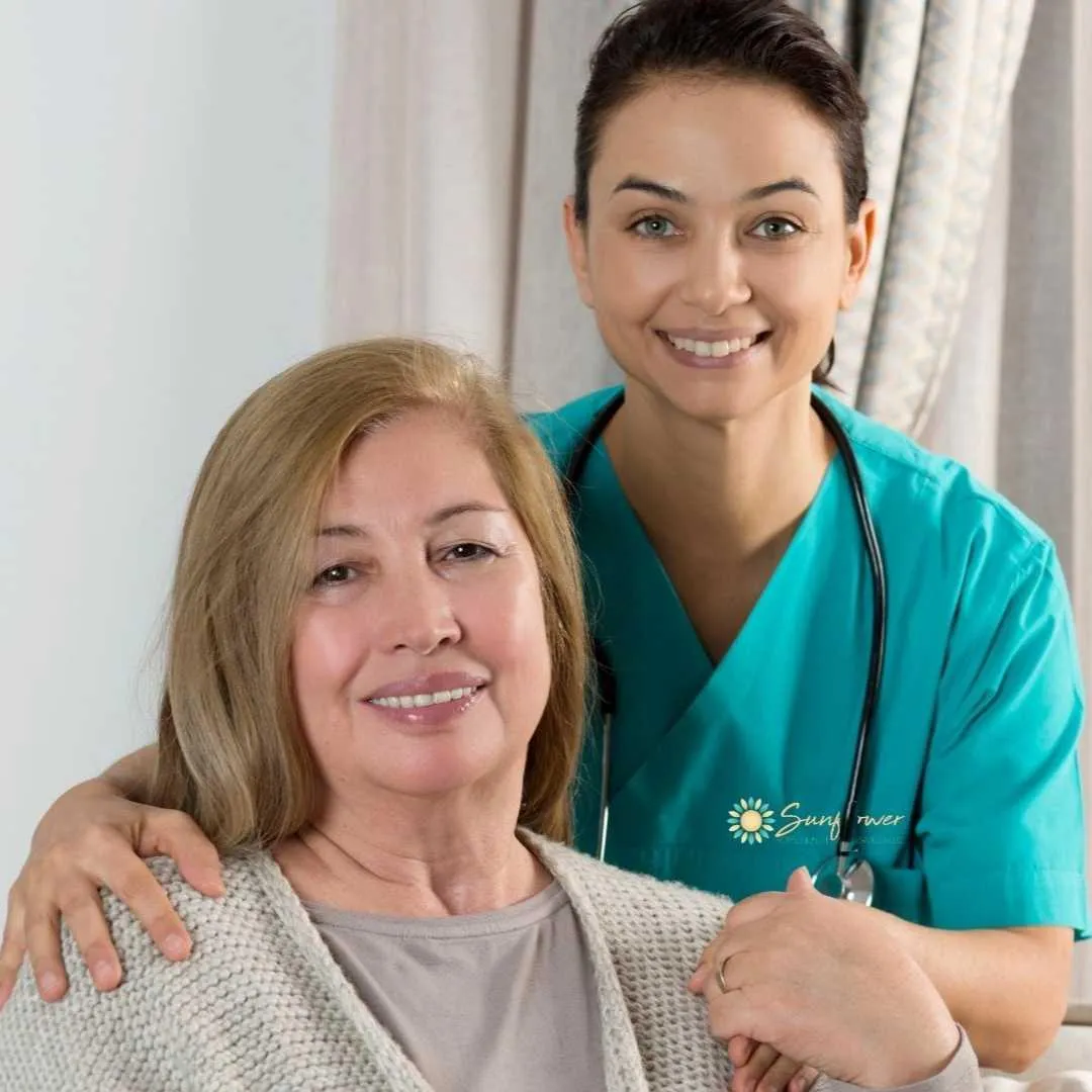 Palliative Care caregiver standing behind palliative care client in Philadelphia