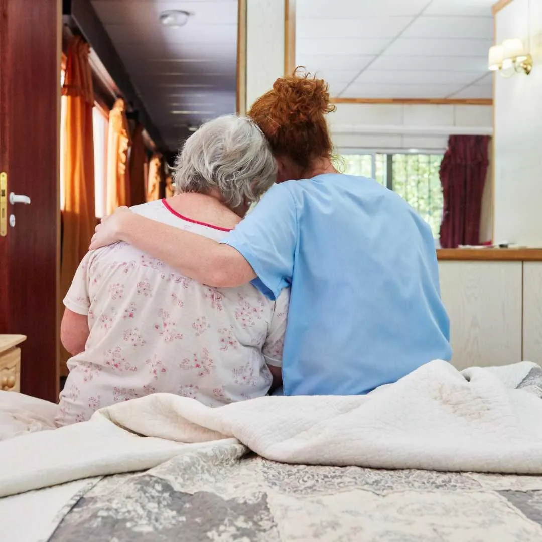 Hospice caregiver hugging hospice care client in Philadelphia