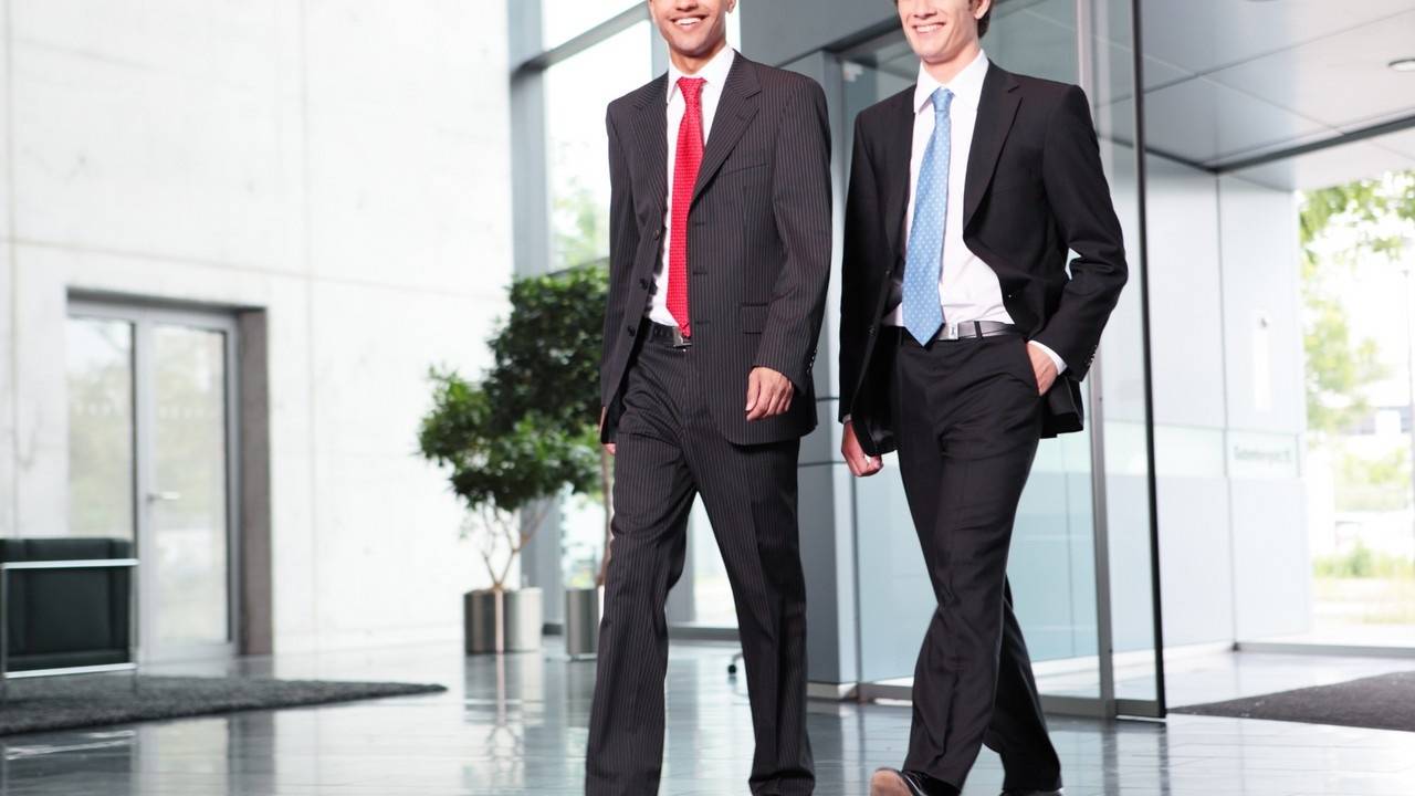 Two business men walking