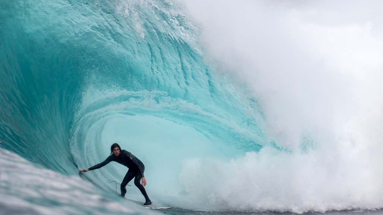 Man surfing a big wave