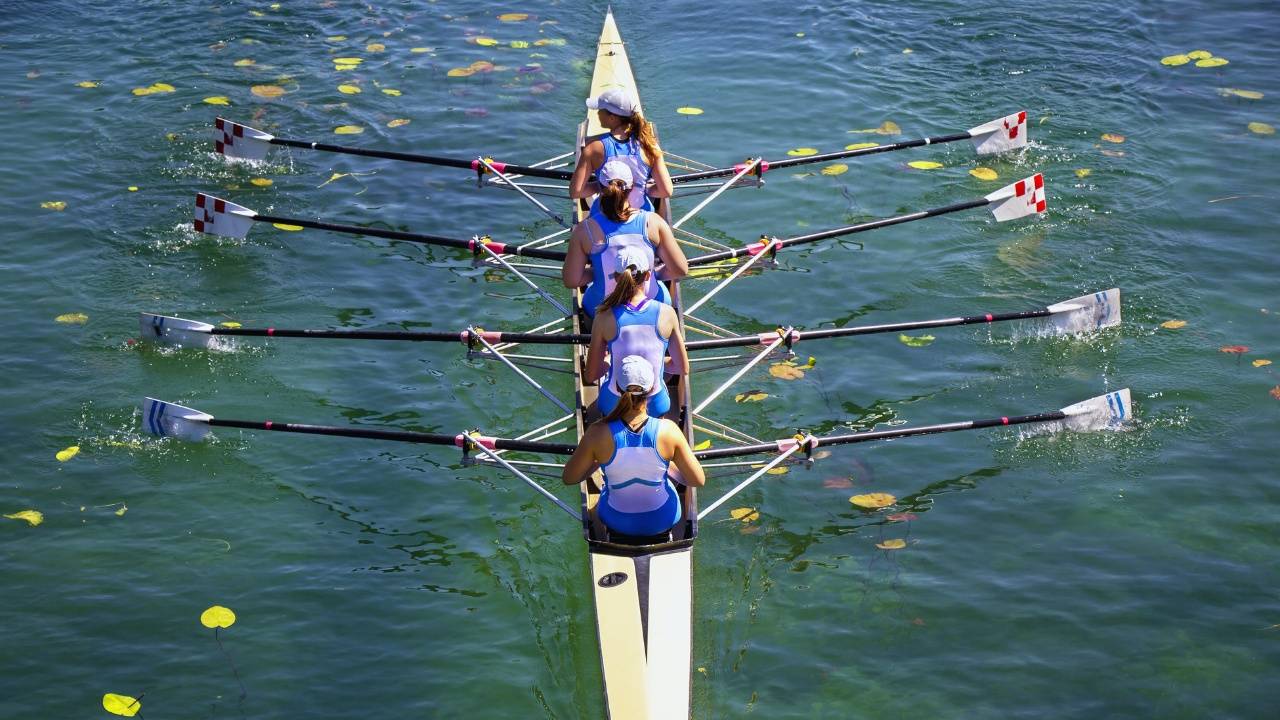 Rowing team working together