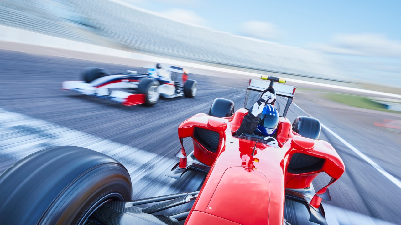 Red race car winning the race