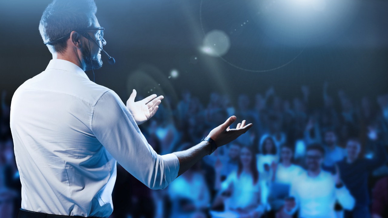 Business leader influencing a captivated audience