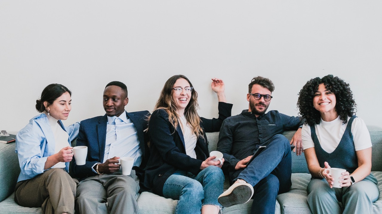 Building Bonds: People in the workplace talking with each other