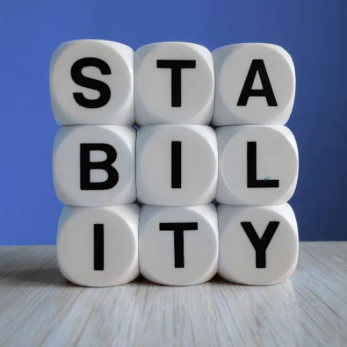 Letter blocks spelling STABILITY symbolizing steady cleared careers in government and defense contracting