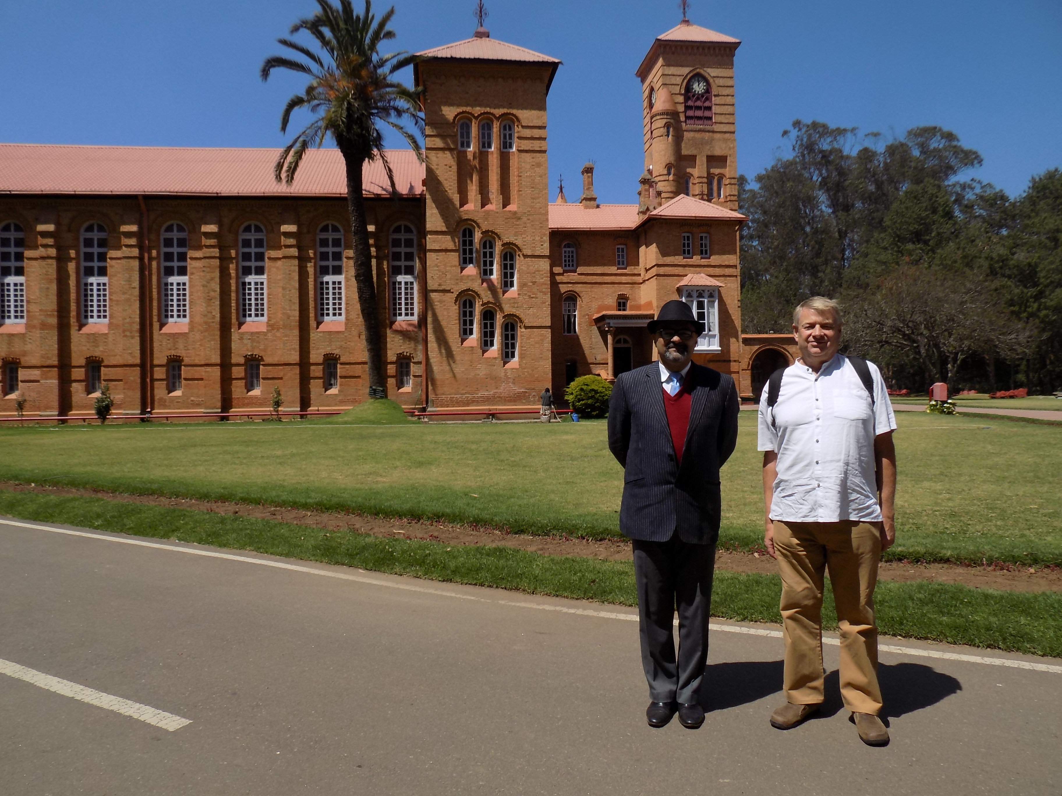 Mark and JoJo in front of Lovedale School