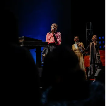woman singing in church