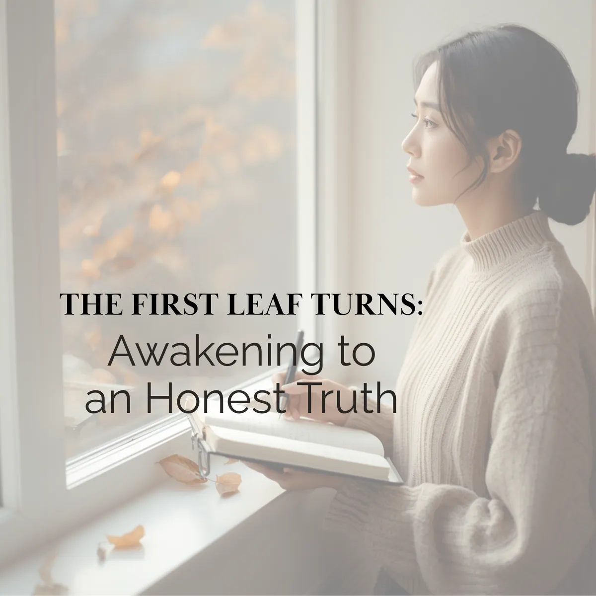 A woman by a window in soft autumn light with an open journal, noticing the first turn of the season, calm and quietly awake.