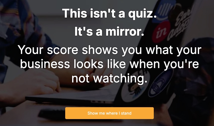 Person holding a printed copy of The People Ops Playbook by Kristen Arnold, a guide for founders to build team ownership, leadership systems, and operational clarity.