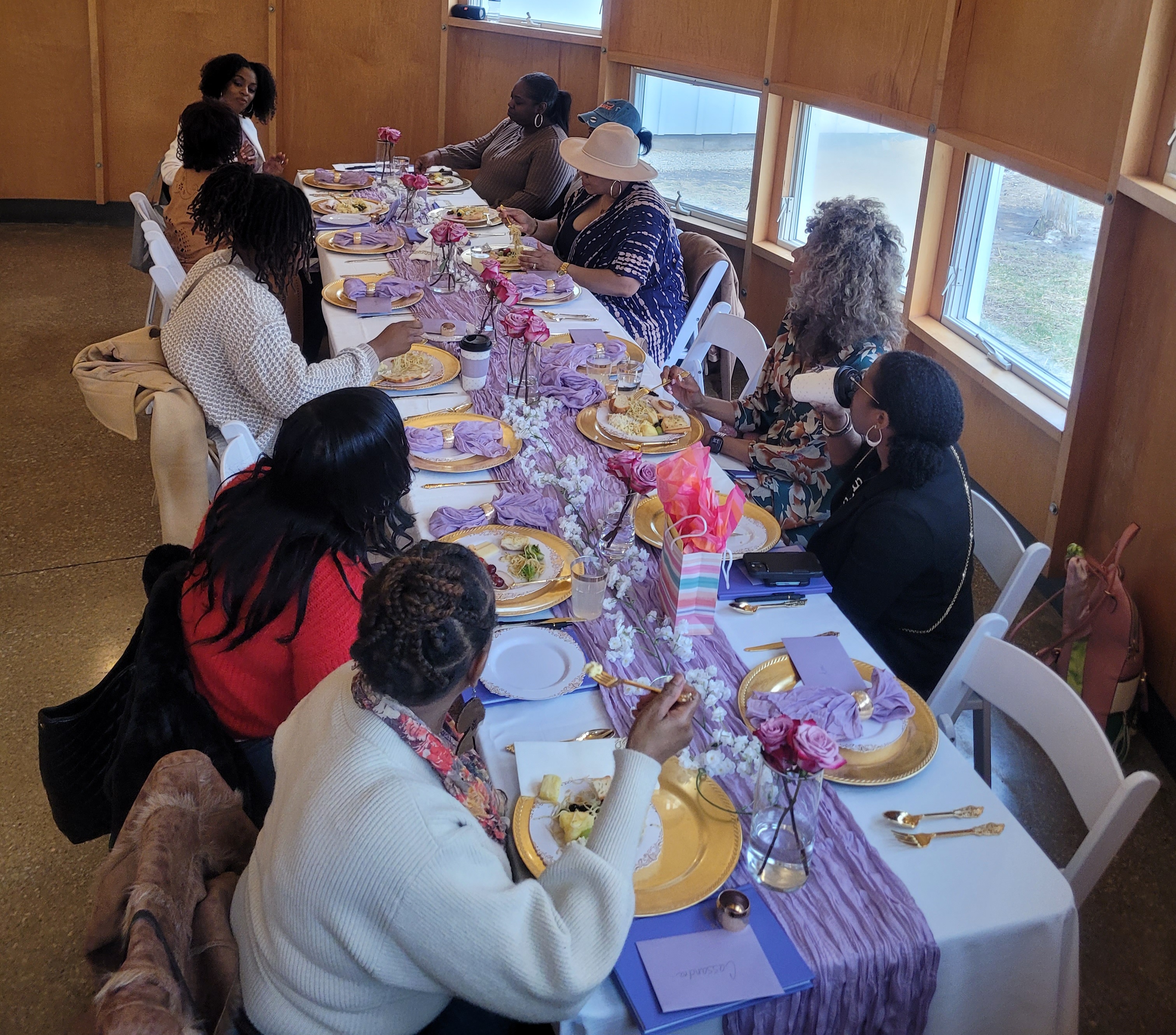 Women at a corporate wellness event hosted by Dee Gilmore