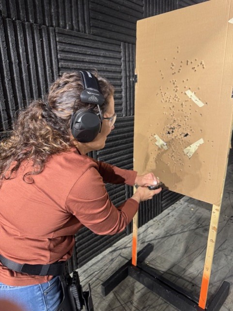 grayscale photo of man wearing boxing gloves
