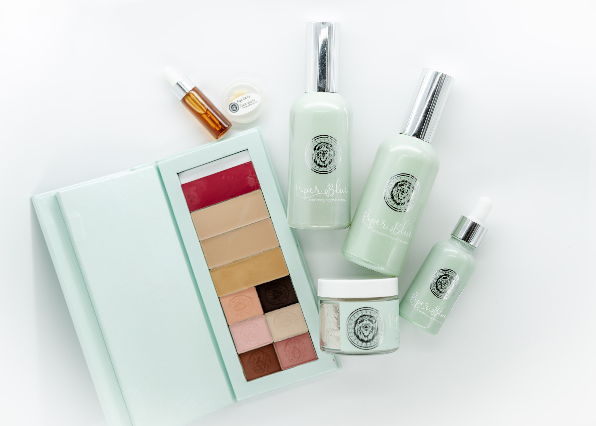 Flat Lay of makeup palette and skincare bottles