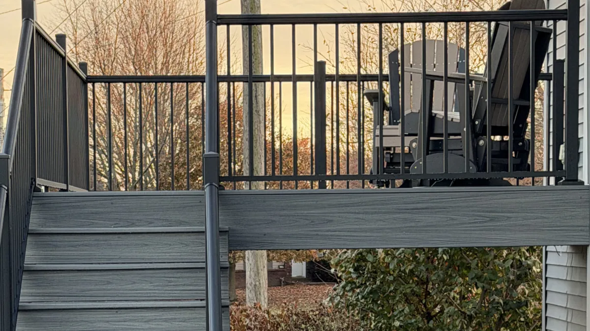 Composite deck stairs with black railing
